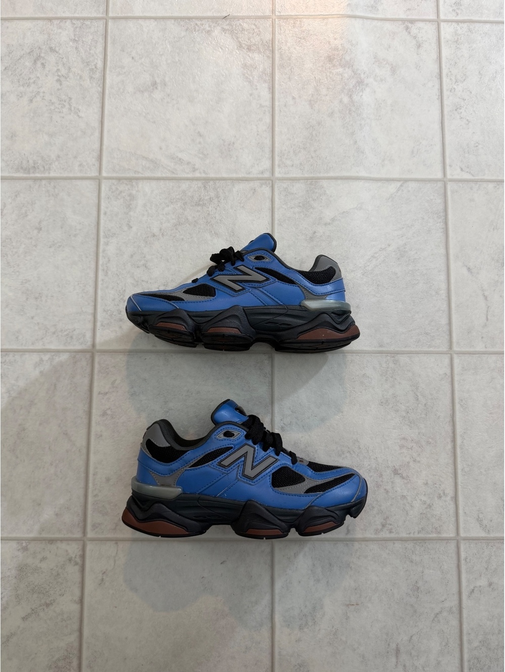 New Balance blue and black sneakers